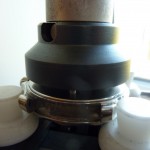 In the back opener tool to safely open the watch without damage - a close up