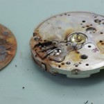 Showing rust under the dial and in the keyless work